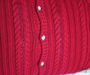 red sweater pillow