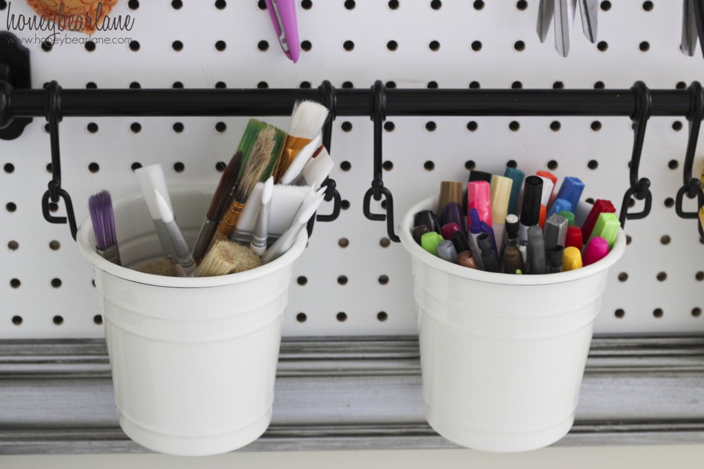 paintbrush and market buckets