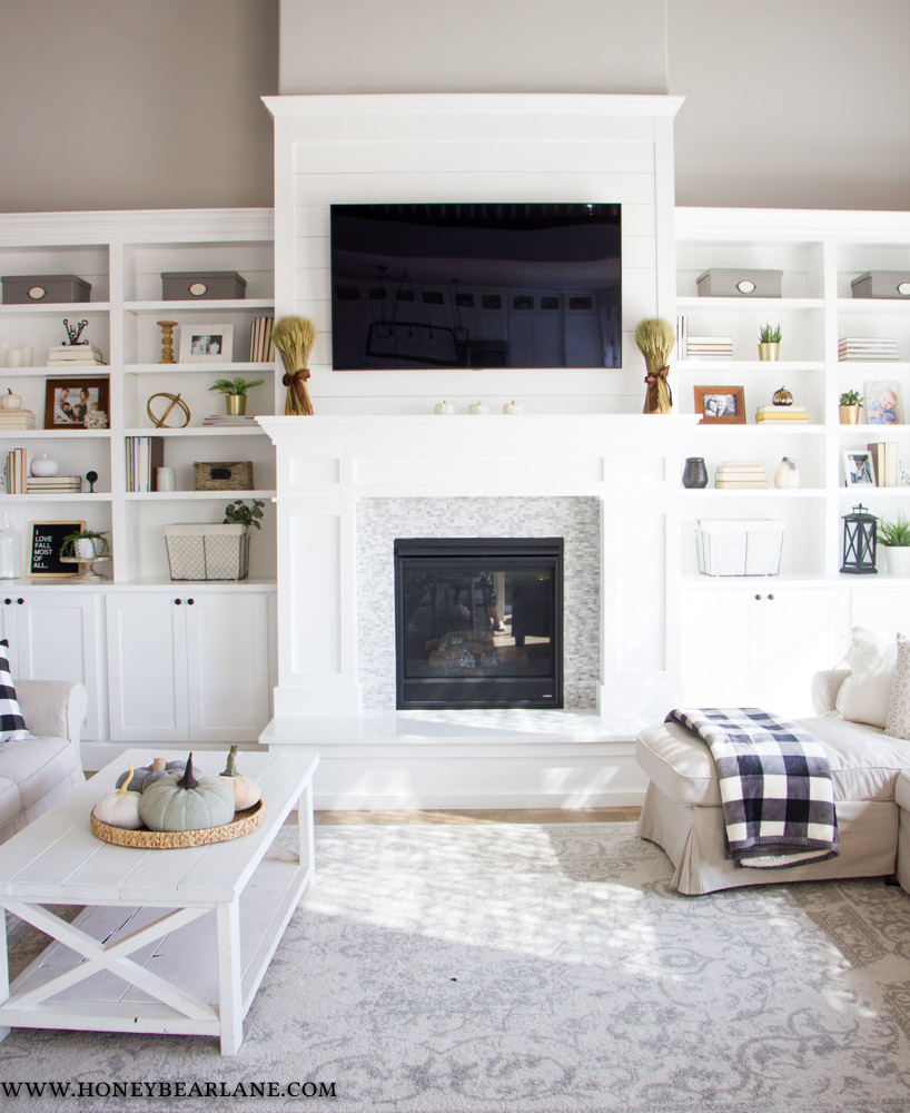 White built ins shop around fireplace